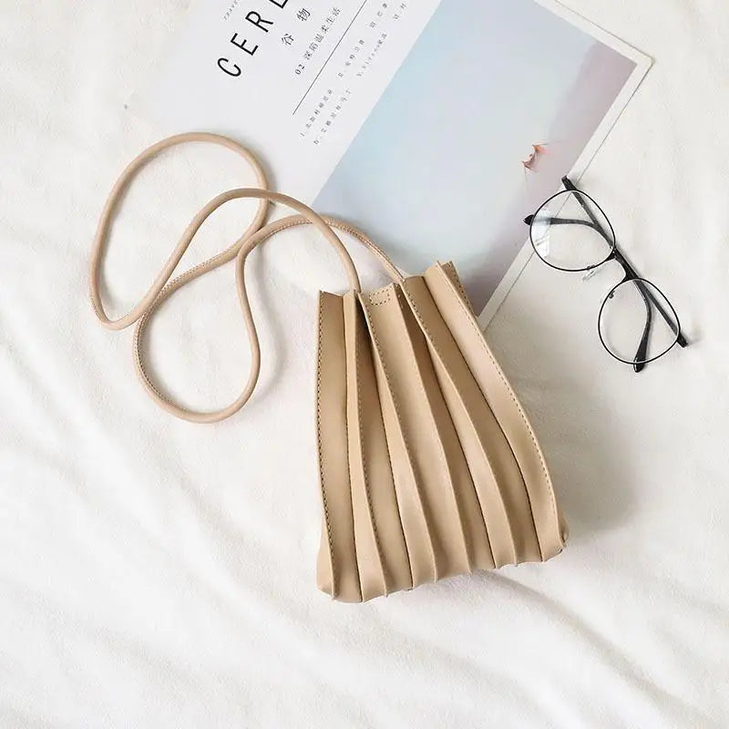Women's mini pleated leather crossbody bag – Compact structured design