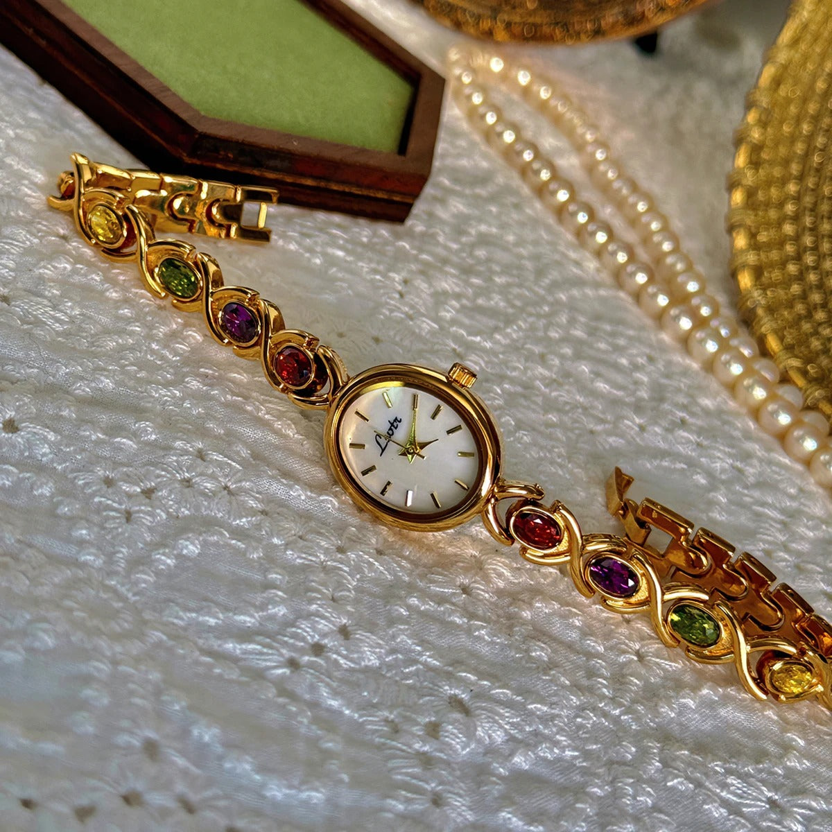 Women's Bracelet Watch – Oval Dial and Gemstone Details