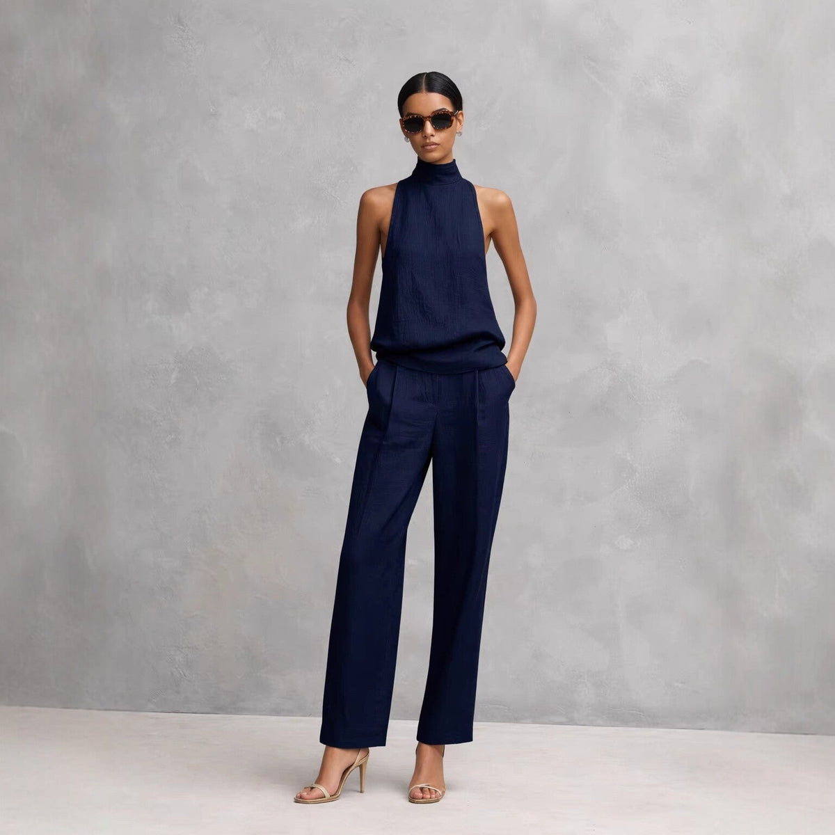 Women's Set: Sleeveless High Neck Top and Wide-Leg Pants – Modern Silhouette