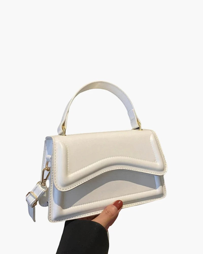 Women's mini leather crossbody bag – Compact size