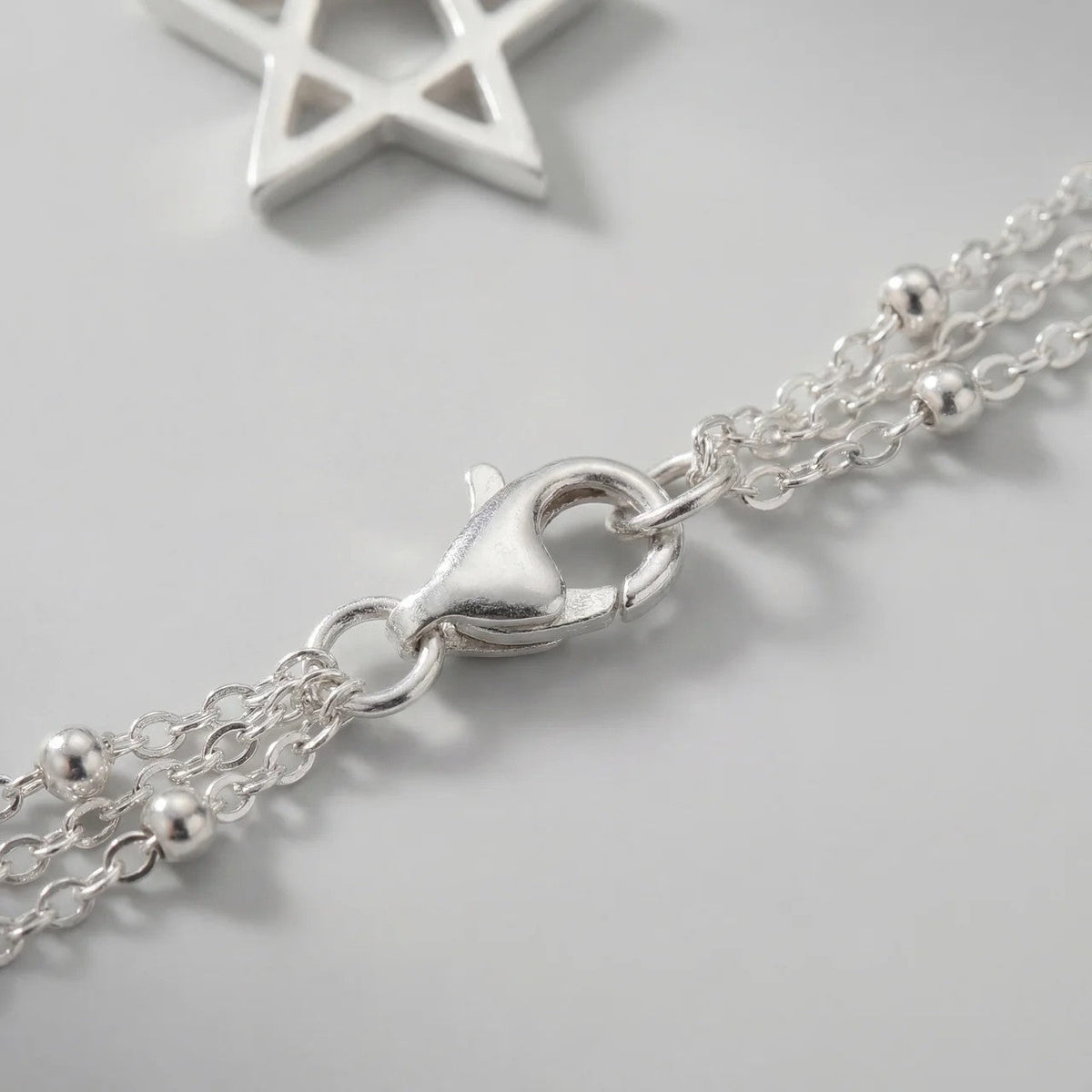 Women's layered star pendant necklace – adjustable chain